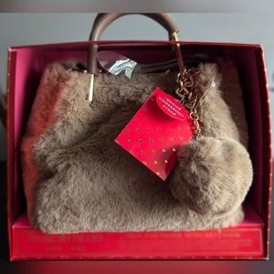 NWT Faux Fur Isaac Mizrahi purse with keychain.